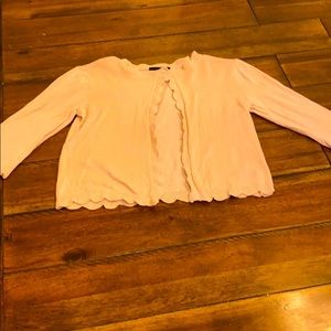Girl’s light sweater . Light pink/ peach